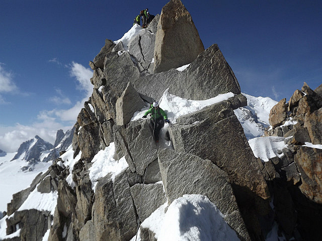 Mixed snow/rock climbing on Arete des Cosmiques