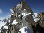Mixed snow/rock climbing on Arete des Cosmiques